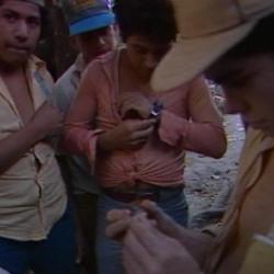 GUERILLA CAMP; CLEANING GUNS; FOOD